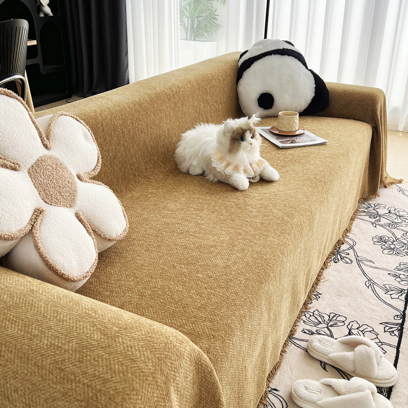 Jeté de canapé en coton naturel sur un fauteuil