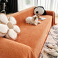 Jeté de canapé orange avec motif chevron en gros plan