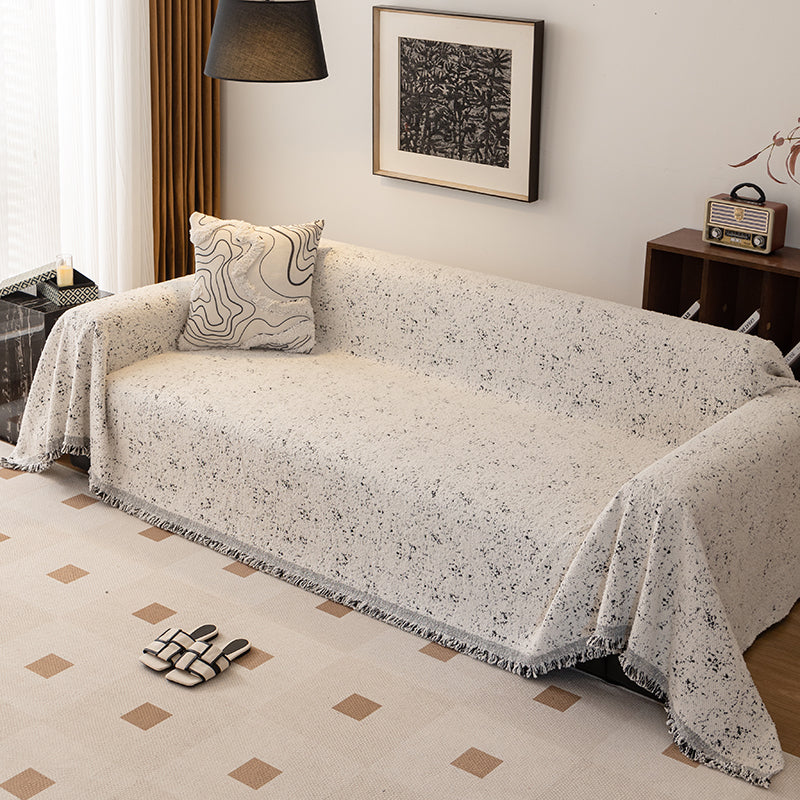 Tissage dense du jeté, idéal pour une protection durable