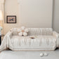 Jeté de canapé en coton naturel sur un canapé beige