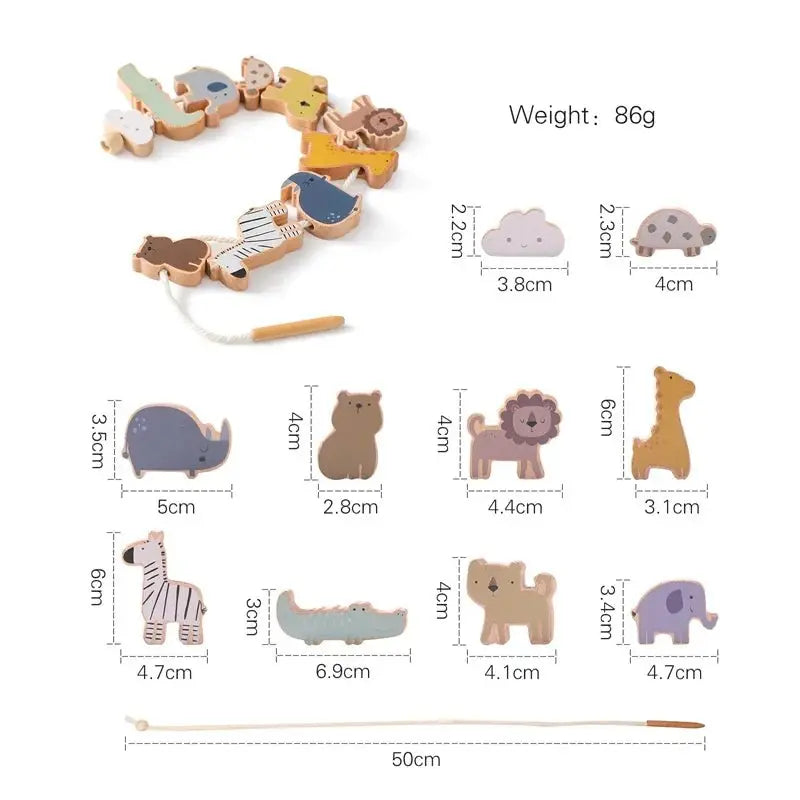 Enfant concentré sur l'empilement des blocs animaux en bois