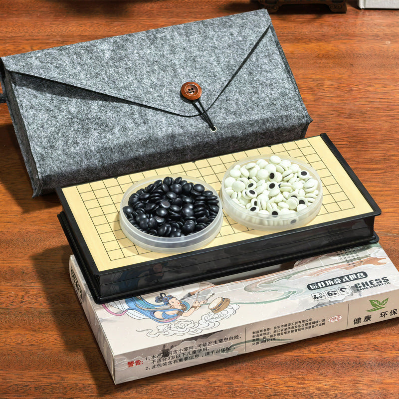 Jeu de Go magnétique avec pierres noires et blanches sur plateau