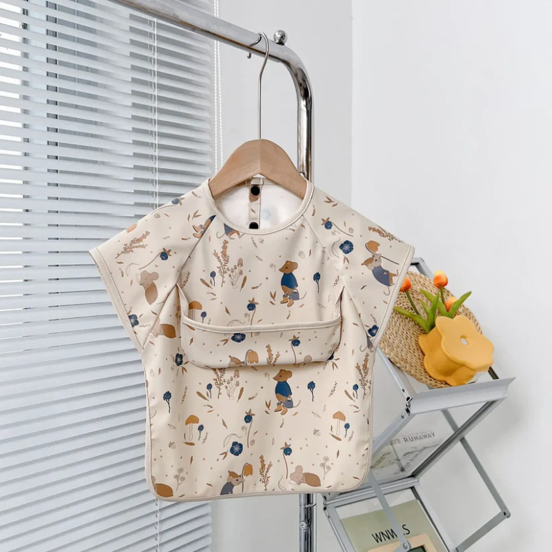 Bavoir tablier enfant avec motifs animaux colorés
