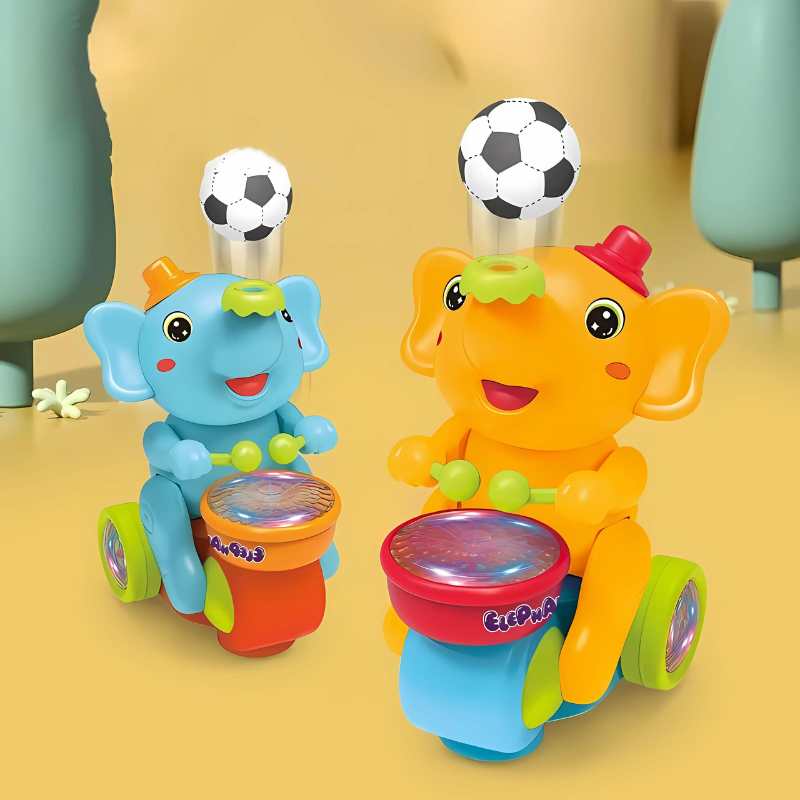 Enfant jouant avec éléphant musical et lumières colorées