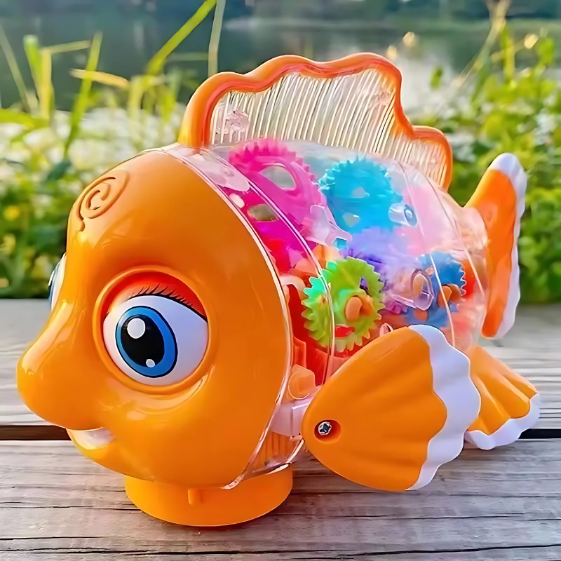 Enfant jouant avec un poisson interactif coloré