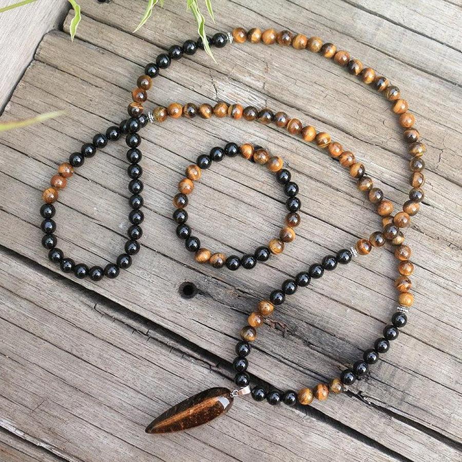 Vue d'ensemble du mala et bracelet en Œil de tigre