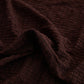 Vue rapprochée de la texture déperlante du tissu