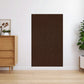 Tapis anti-griffes marron sur un canapé en cuir