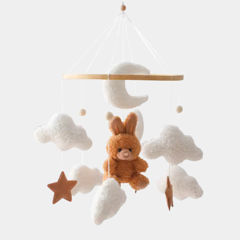 Mobile musical avec lapin brun suspendu