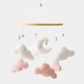 Mobile musical avec nuage rose suspendu