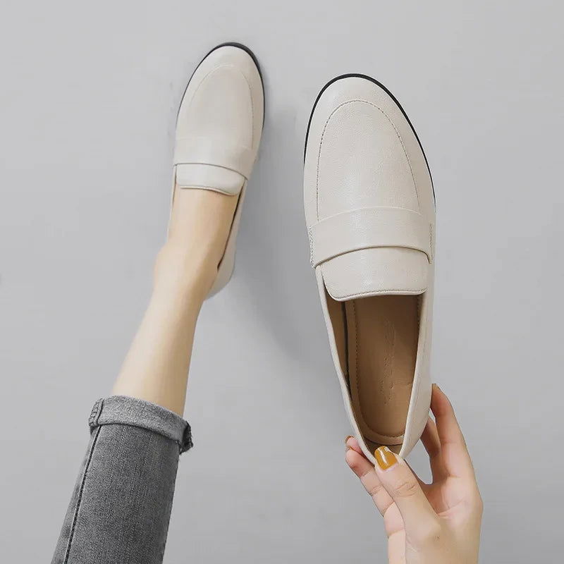 Mocassins femme en cuir marron avec couture apparente