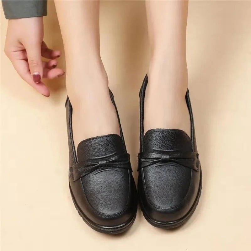 Mocassins noirs avec nœud délicat en simili cuir