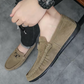 Vue arrière des mocassins, montrant le talon et la finition soignée