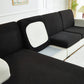 Vue latérale d'une housse noire sur un coussin