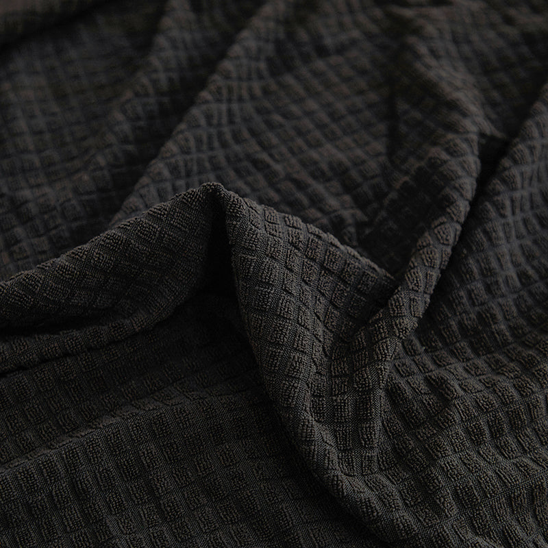 Détail du tissu Jacquard noir résistant aux taches