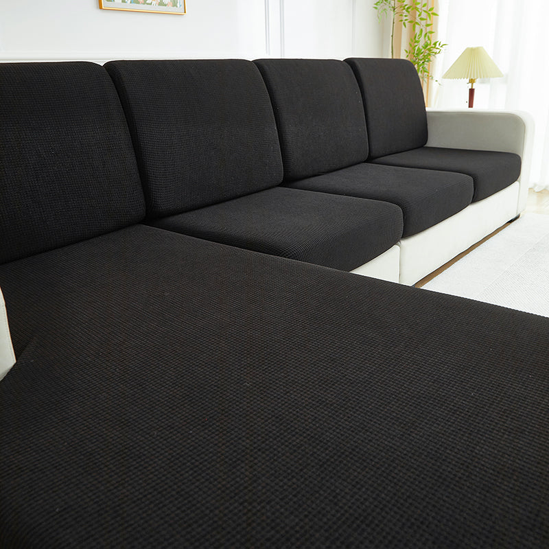 Gros plan sur le motif Jacquard noir de la housse