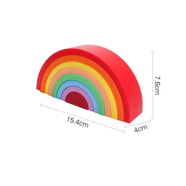 Puzzle en bois pastel avec arcs empilés en forme d'arc-en-ciel