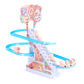 Cochon en plastique rose sur le toboggan pour enfants