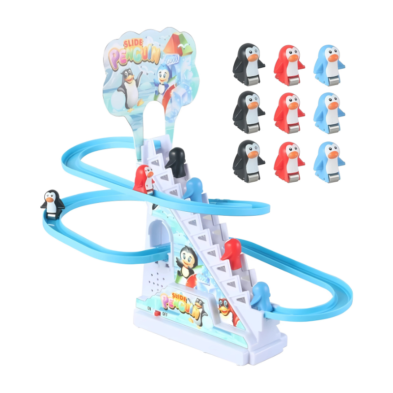 Figurine de pingouin sur le toboggan, prête à glisser