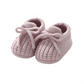 Chaussons bébé en maille rose, style fait main