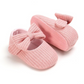 Chaussures bébé roses avec nœud décoratif