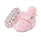 Chaussons roses pour bébé avec design inspiré des étoiles