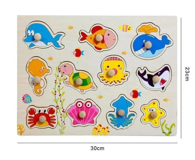 Puzzle en bois avec pièces d'animaux marins colorés