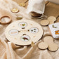 Ensemble de pièces en bois illustrant des cycles naturels