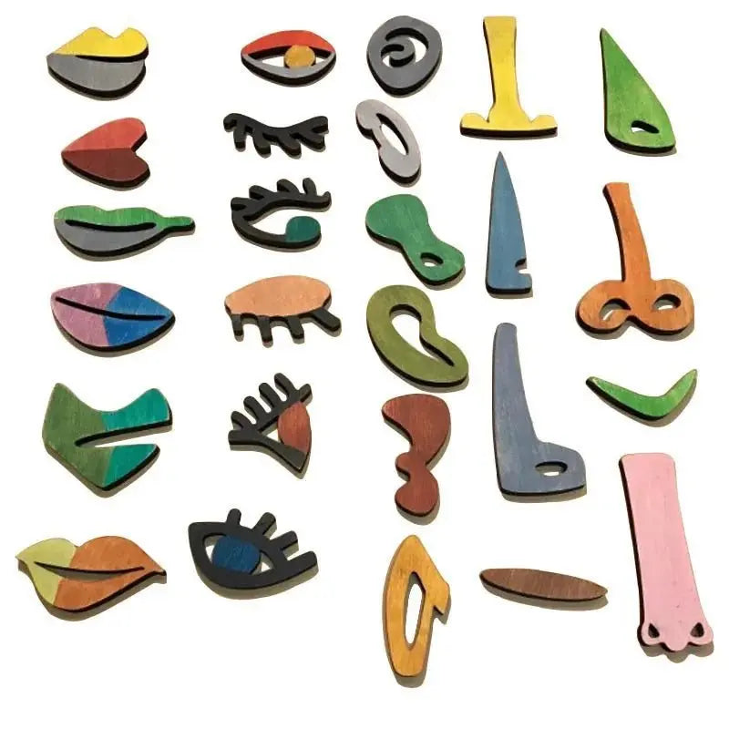 Gros plan sur des pièces de puzzle en bois pour créer des visages
