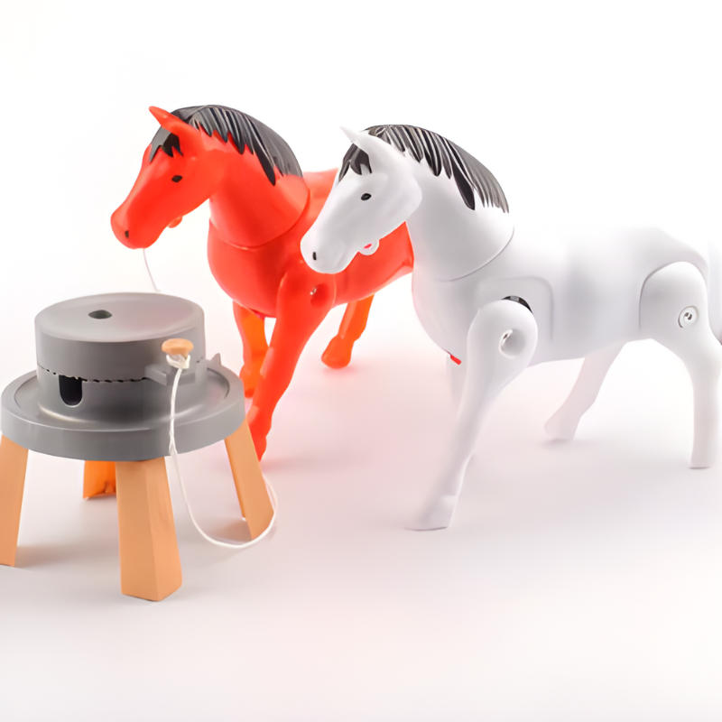 Ensemble de jouets à tirer rouge et blanc sur une table