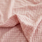 Motif tissé de la housse rose, détail du jacquard