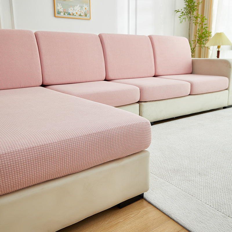 Gros plan sur motif jacquard élégant de la housse rose