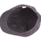 Gros plan sur la texture en laine d'une casquette beige