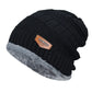 Détail du patch en cuir cousu sur le bonnet