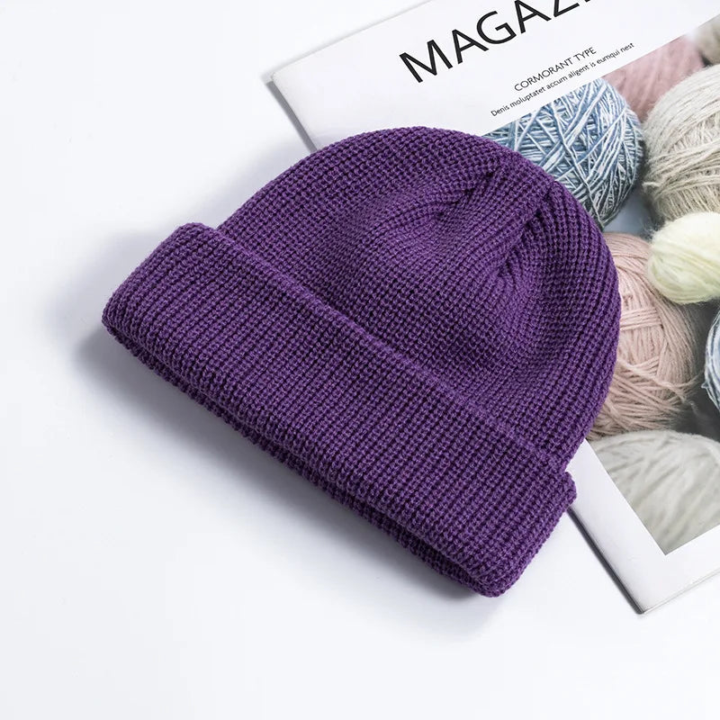 Vue de profil d'un bonnet docker noir sur un mannequin