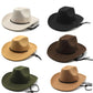 Chapeau cowboy posé sur une surface en bois