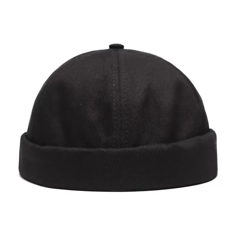 Détail de la boucle métallique sur un bonnet
