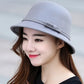 Chapeau cloche avec décoration florale, style raffiné