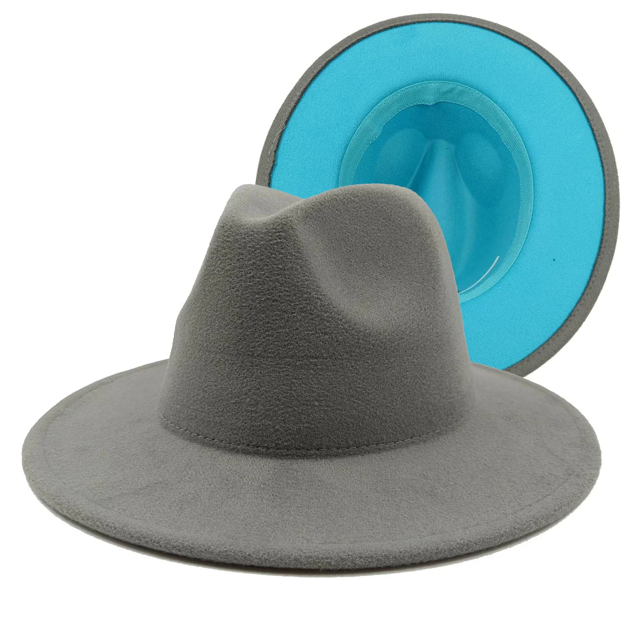 Chapeau Fedora avec ombre projetée sur mur