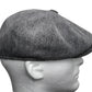 Homme posant avec un béret, ambiance décontractée