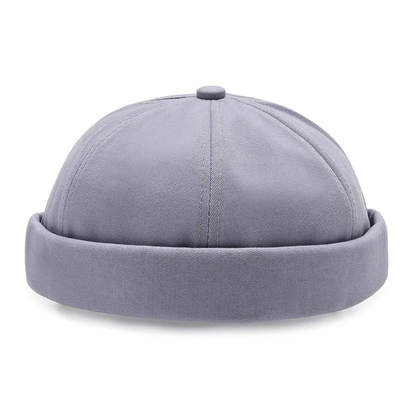 Vue arrière d'un bonnet Docker vert, coupe ajustée