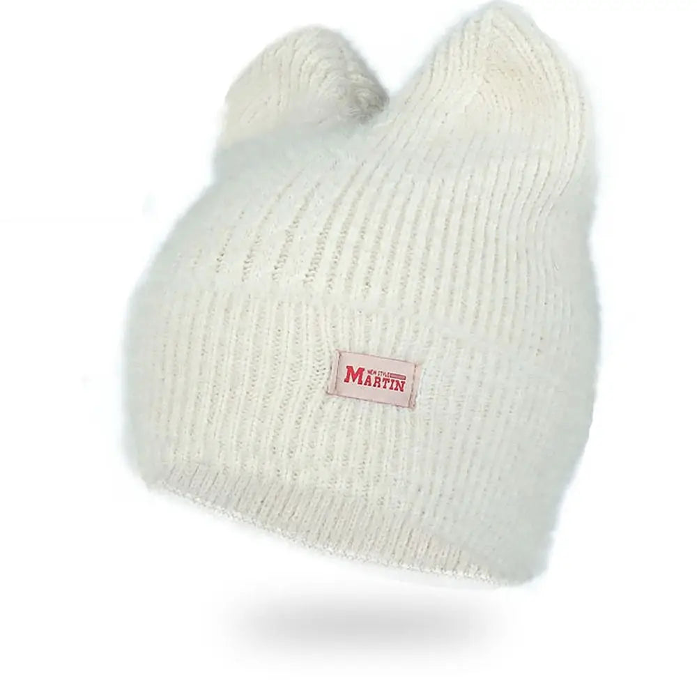 Bonnet en laine, détail de la maille torsadée