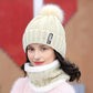 Bonnet en maille torsadée avec pompon en fausse fourrure