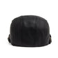 Vue latérale d'un béret en cuir élégant