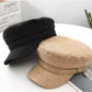 Gros plan sur la texture du béret en coton