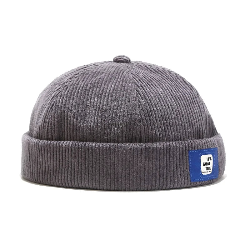 Bonnet camel, sangle ajustable et écusson brodé