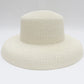 Détail du tissage serré d'un chapeau de paille