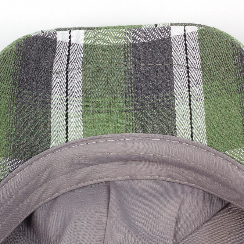 Détail du tissu en coton à carreaux de la casquette gavroche