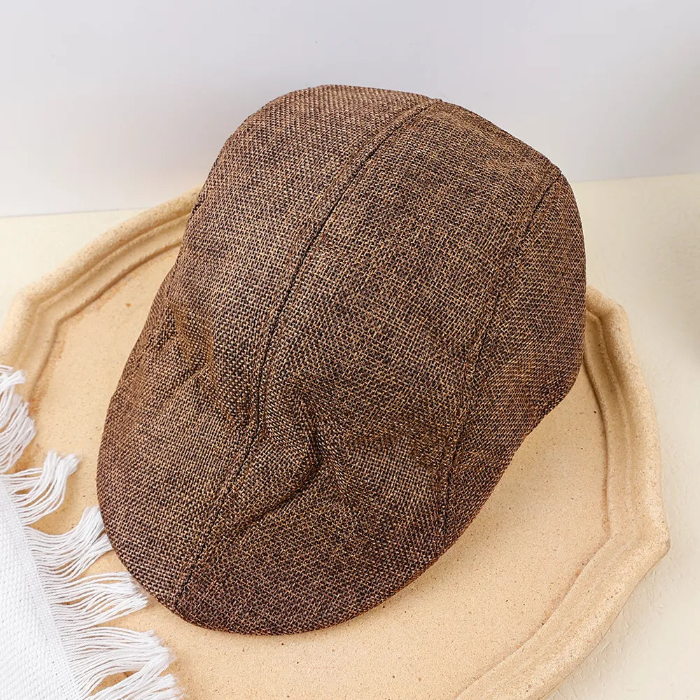 Silhouette masculine avec béret, arrière-plan flou