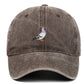 Casquette respirante avec motif oiseau brodé